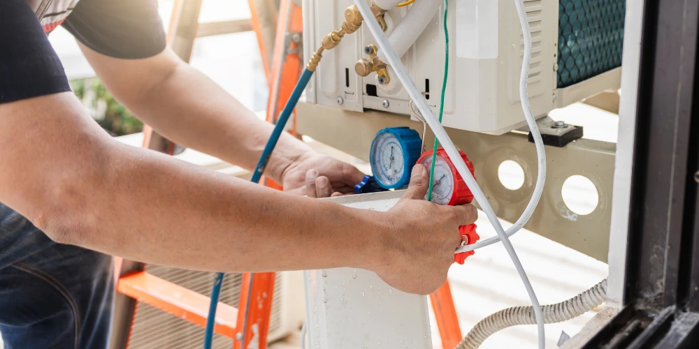 Frozen aircon evaporator coil covered in ice leading to indoor water dripping